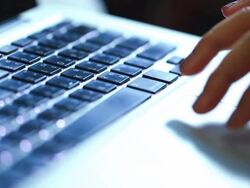 Woman using laptop Stock Footage