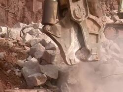 CU Demolition of crushing machine at quarry by bulldozer / Taben-Rodt, Rhineland-Palatinate, Germany Stock Footage