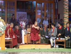 WS Dalai Lama presenting  with book from  fellow monk on his 70th birthday AUDIO / Dharmasala, Himachal Pradesh, India Stock Footage