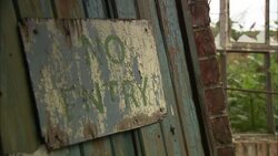 A rusty sign reads No Entry. Stock Footage