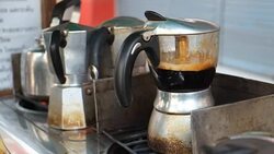 moka pot use coffee maker with hot coffee Stock Footage