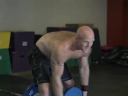  Dustin removes weight from barbell. Stock Footage