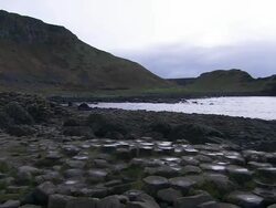 Giant's Causeway pan across bay to sea, Northern Ireland Stock Footage