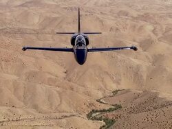 AIR TO AIR, MS, Aero L-39 Albatros flaying over Mojave Desert hills, California, USA Stock Footage