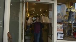 friends looking at smart phone and filming girls trying on clothes and posing Stock Footage