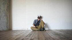 Young adult man and a virtual reality headset.Guy using vr glasses Stock Footage