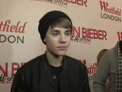 INTERVIEW: Justin Bieber on wanting to work with Stevie Wonder at the Justin Bieber Turns On Westfield Christmas Lights at London England. (Footage by WireImage Video/Getty Images Entertainment Video) Stock Footage