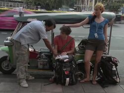 WS ZI Young couple looking at guidebook and talking to taxi bike driver, Bangkok, Thailand Stock Footage