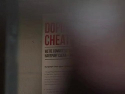 Anti doping poster and woman weightlifting in gym News Clip
