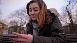 Woman using smartphone Stock Footage
