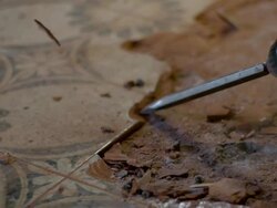 SLO MO Removing tiles with jackhammer Stock Footage