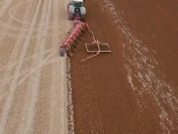 Aerial view of Tractor Ploughing Stock Footage