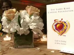 ATMOSPHERE: signage at 18th Annual Larry King Cardiac Foundation Gala Stock Footage