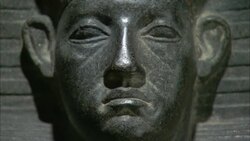 A statue depicts a frowning face with large ears in Luxor, Egypt. Stock Footage