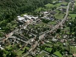 MS AERIAL ZI TS View of small village surrounded by tree / Pas-de-Calais, France Stock Footage