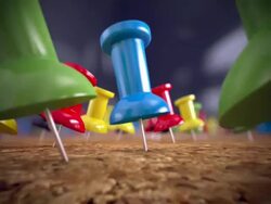 Colorful thumb tacks on a cork board. Loopable CG. Stock Footage