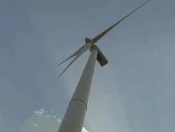 Tilt up windmill against sky tenkasi tamil nadu Stock Footage