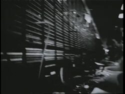 A line of telephone operators operate switchboards. News Clip