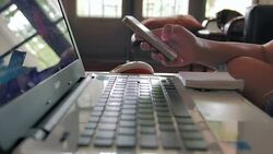 Young woman working at home Stock Footage
