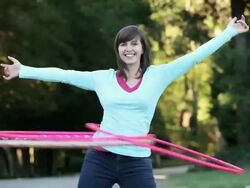 MS TU Young woman hula hooping on country street / Richmond, Virginia, United States Stock Footage