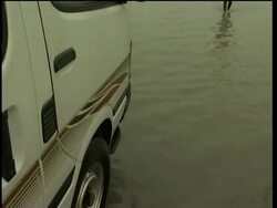 WRAP Dramatic pix from flooded region; aid workers, voxpop News Clip