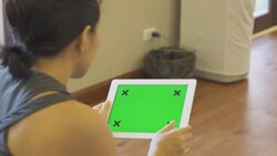 women using tablet phone with green screen Stock Footage