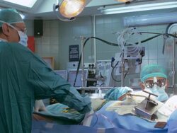 Surgeons operating a patient Stock Footage