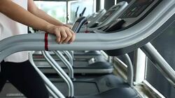 sport women running on treadmill cardio equipment Stock Footage