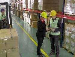 Shaking Hands With Warehouse Manager Stock Footage