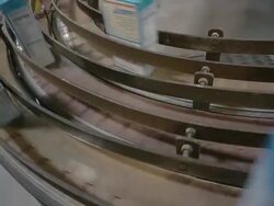 MS Curved automated line of baking mix boxes moving / Chelsea, Michigan, United States Stock Footage