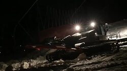 Machine for leveling the ski slopes works at night. Stock Footage