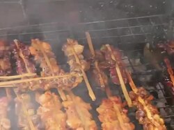 Grilling Chicken with a lot of smoke Stock Footage