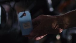 Shop worker hangs price tags on new bikes and manages inventory on tablet computer Stock Footage