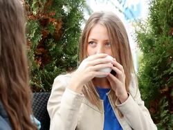 Two young women in cafe Stock Footage