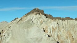 The two-toned Cardinal Mountain, one of the peaks reaching over thirteen thousand feet in the Sierra Nevadas. Stock Footage