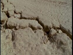 CU tilt up, Fault line running through desert, Gujarat, India Stock Footage