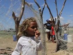 MS Shot of Family collecting water from shafts / Pilao Arcado, Bahia, Brazil Stock Footage