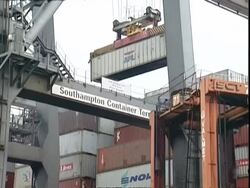 Containers being moved, Container Terminal, Southampton, UK Stock Footage