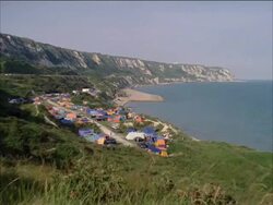 Campsite and caravans late 1960s/1970, England, UK.  Late 1960s to 1970 Stock Footage