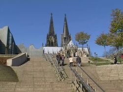 MS LA Shot of Philharmonie Koln and Dom (Cathedral) / Cologne, North Rhine Westphalia, Germany Stock Footage