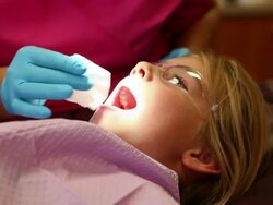 MS Young girl sitting in dentist chair / Lamy, New Mexico, United States Stock Footage