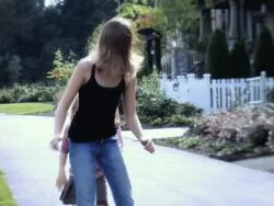 WS Girls playing hopscotch on sidewalk / Langley, British Columbia, Canada.  Stock Footage