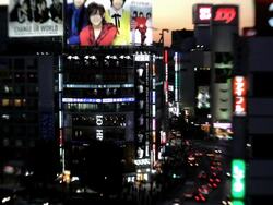 City centre road traffic at night, using Lensbaby,  Shinjuku, Tokyo City centre, Japan, Asia Stock Footage