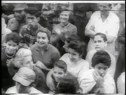 B/W 1959 high angle crowd looking up, smiling + clapping / post-revolution Havana / newsreel Stock Footage