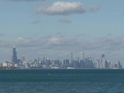 Chicago city skyline over Lake Michigan. News Clip