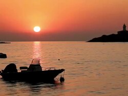 MS Boat floating on ocean at sunrise time / Mallorca, Balearic Islands, Spain Stock Footage