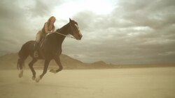 (Slow Motion) Riding Horses in the Dessert 04 Stock Footage