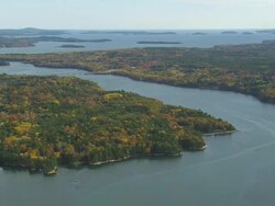 WS ARIEAL View of Bridge with woods area / Maine, United States Stock Footage