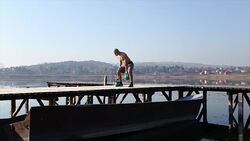 Doing exercise with kettle Stock Footage