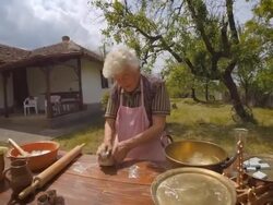 Cooking With Grandma-Old Farmer Lady Making a Loaf of Bread Stock Footage